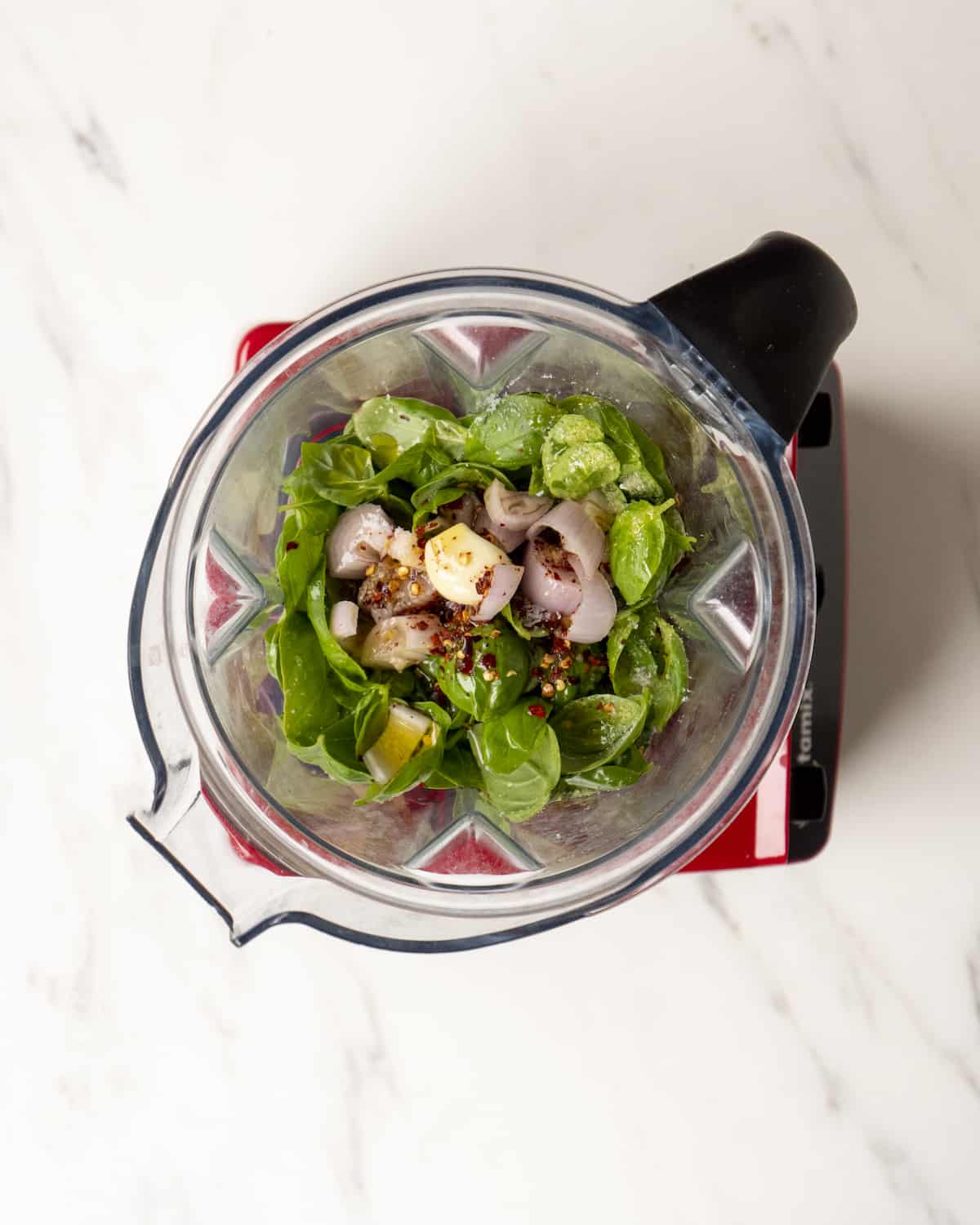Basil Vinaigrette Ingredients: shallot, basil, garlic, red pepper flakes, olive oil, red wine vinegar, salt and pepper in a food processor
