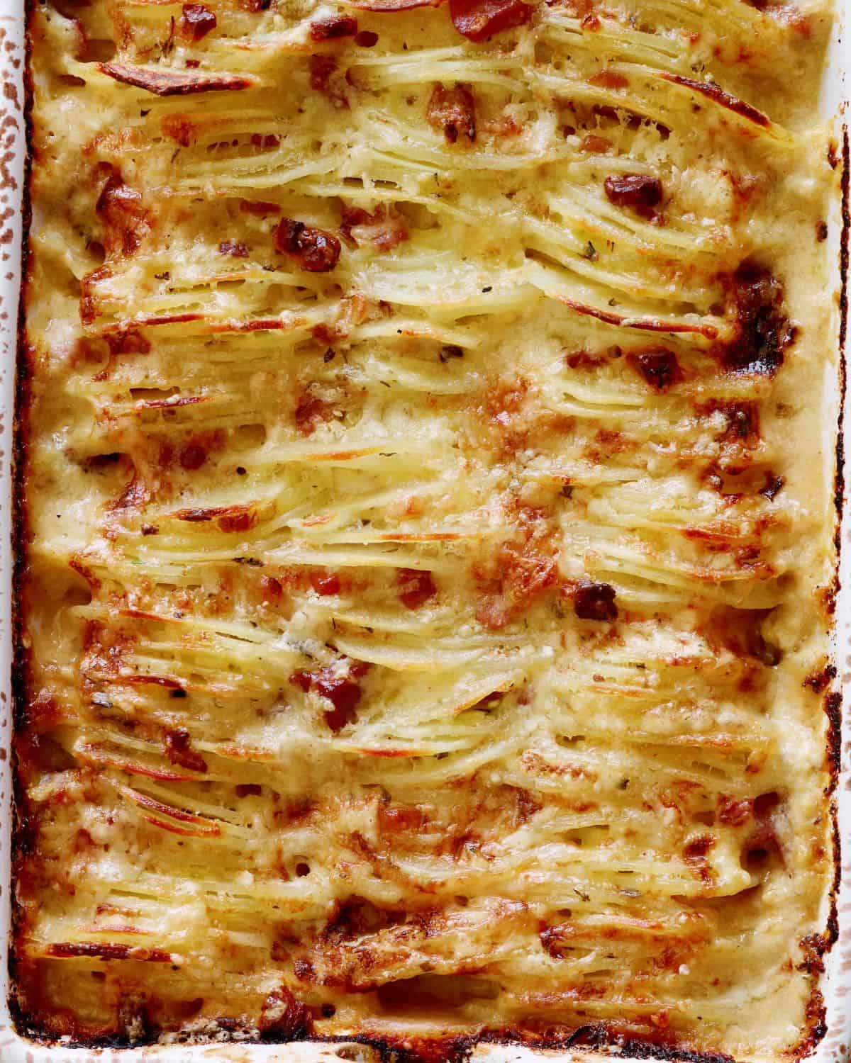 A close-up shot of hasselback scallop potatoes.