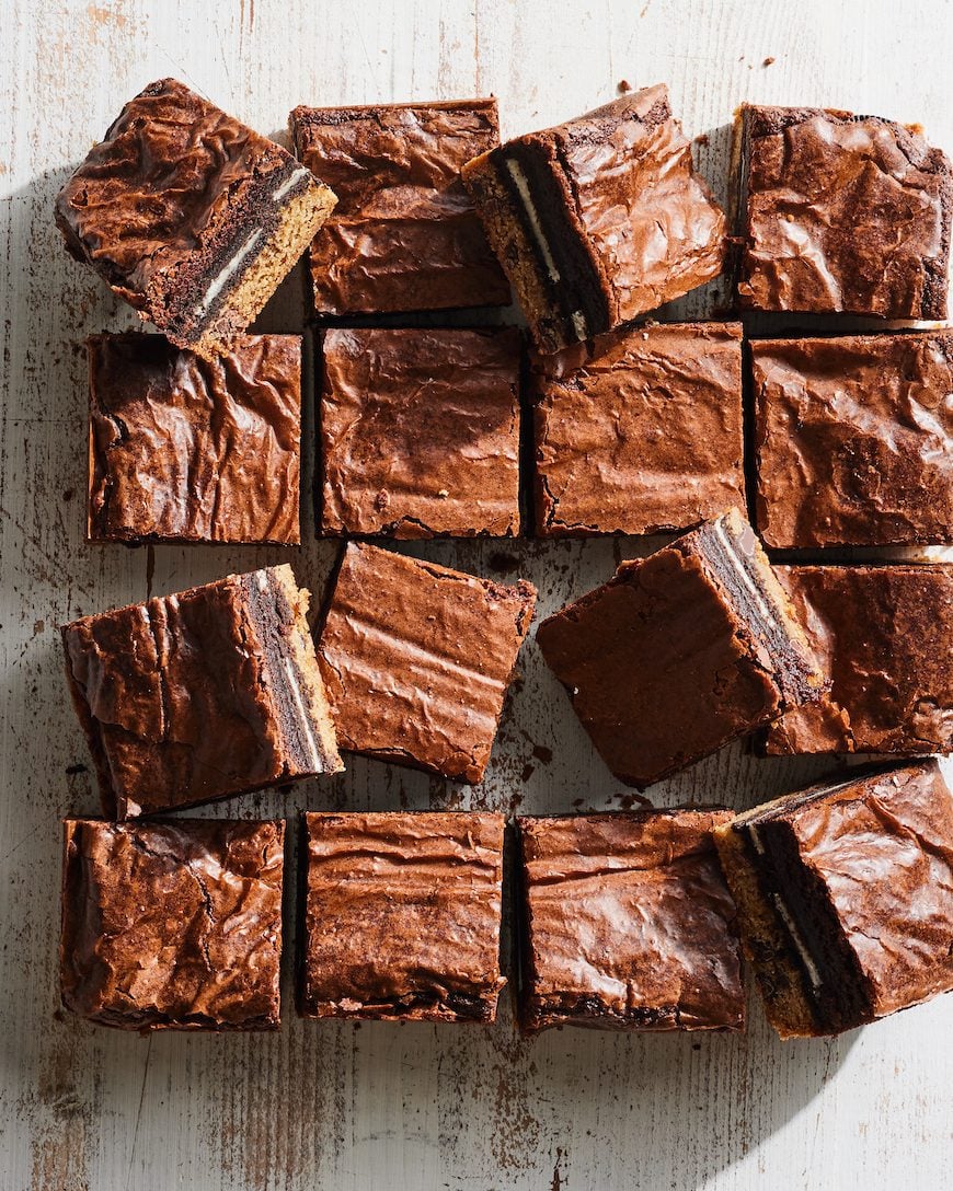 16 Slutty Brownies sitting on a wood table